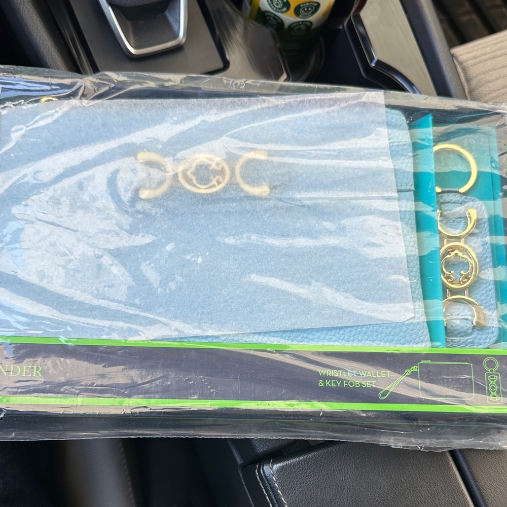 C. Wonder Blue and Gold Wristlet Wallet